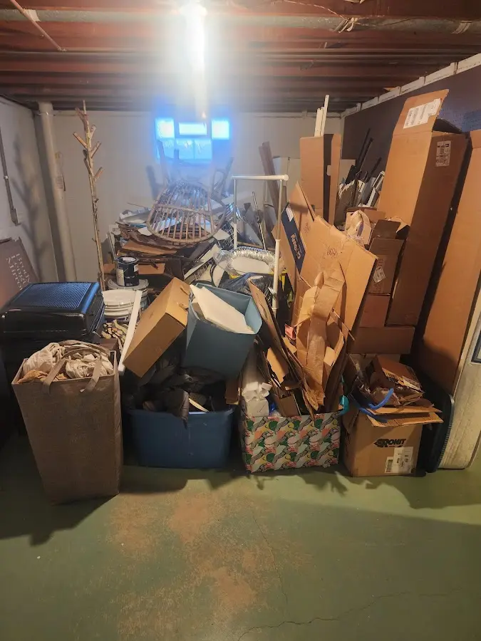 Roll-off dumpster container at job site for Concrete Dumpster Rental in Plymouth